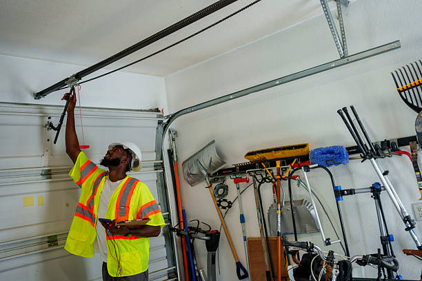 Professional Garage Door technician working in Lake Dalecarlia, IN